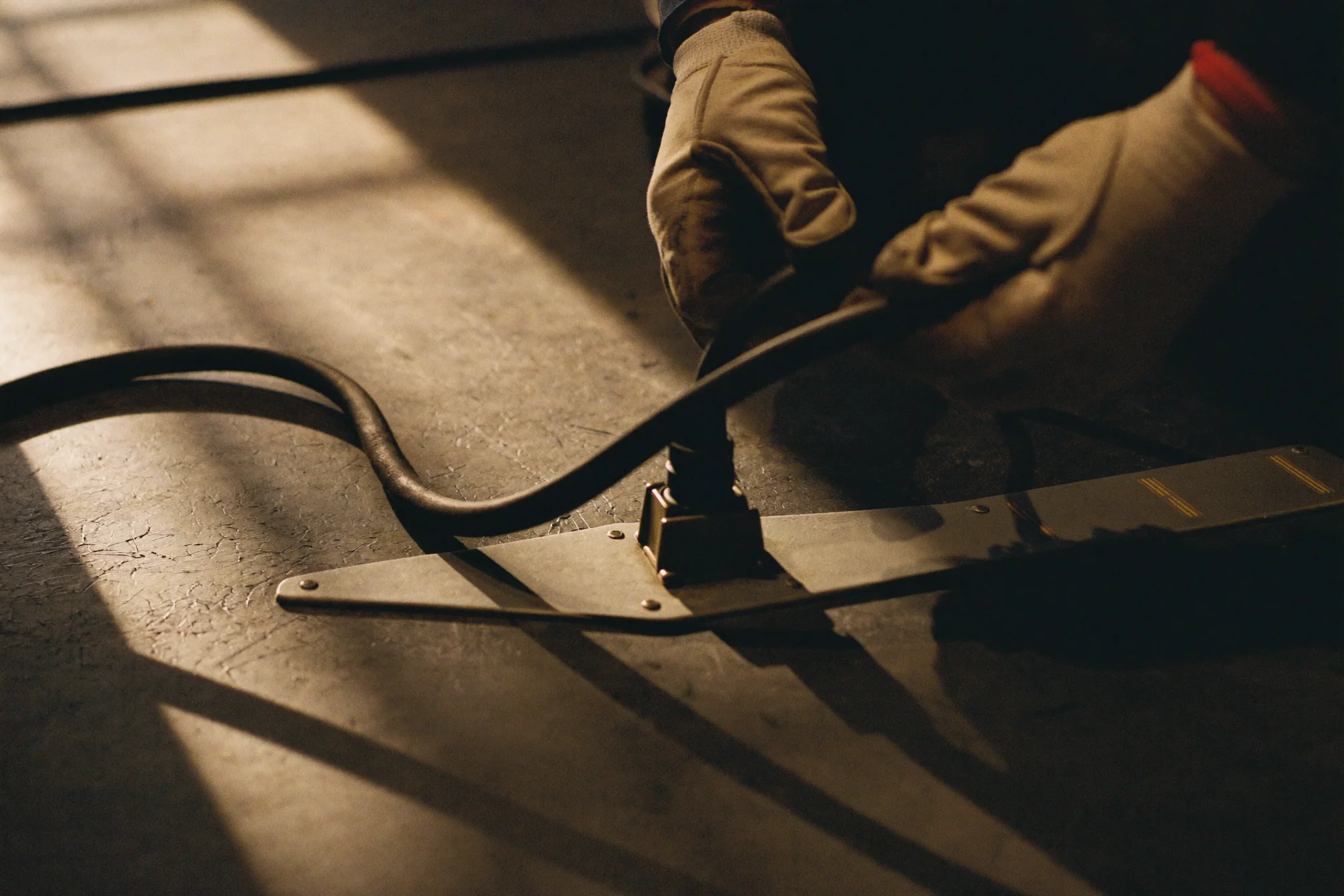 A gloved crew hand during festival load-in.
